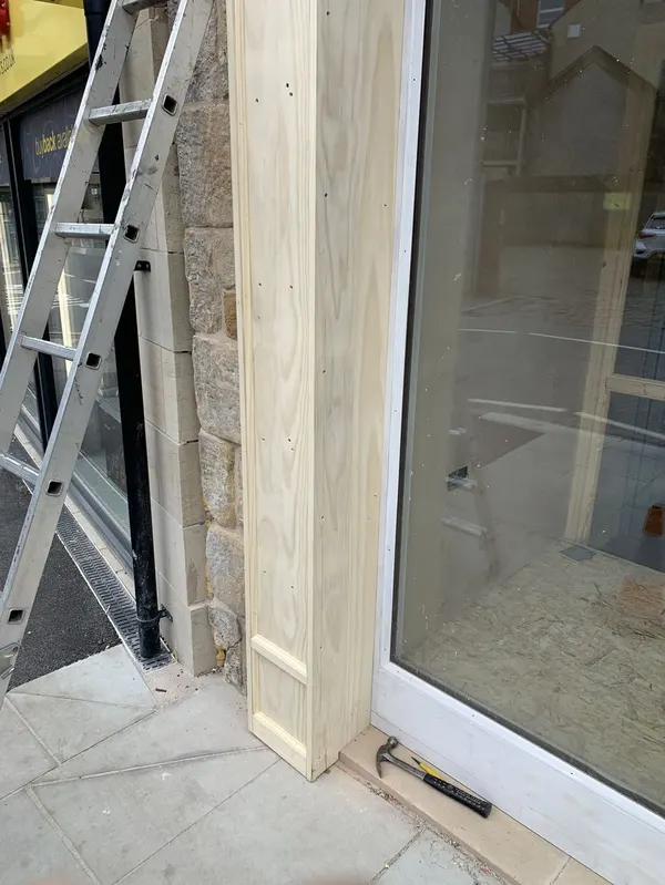 Commercial office fit-out with bespoke joinery and tiled kitchen area in Blackpool