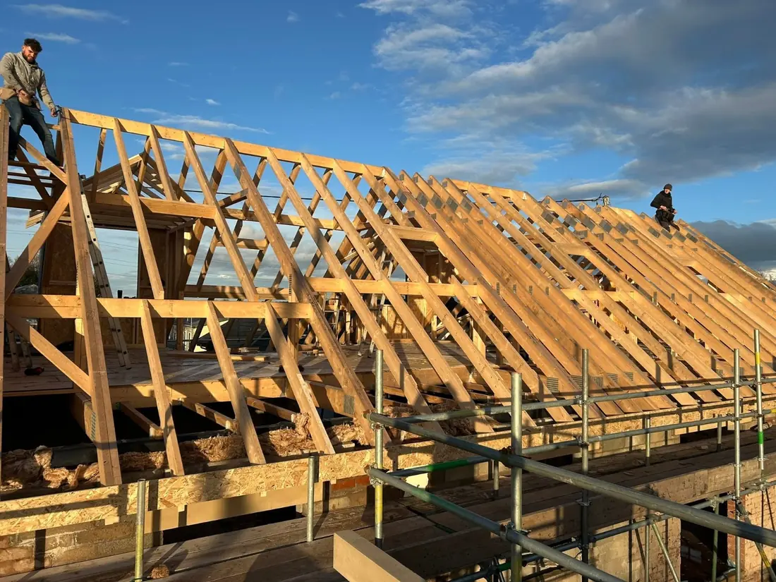New roof structure being built on a house extension in Blackpool